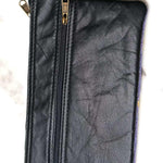 A stylish and ethically made wristlet purse to carry all your everyday essentials.