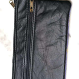 A stylish and ethically made wristlet purse to carry all your everyday essentials.
