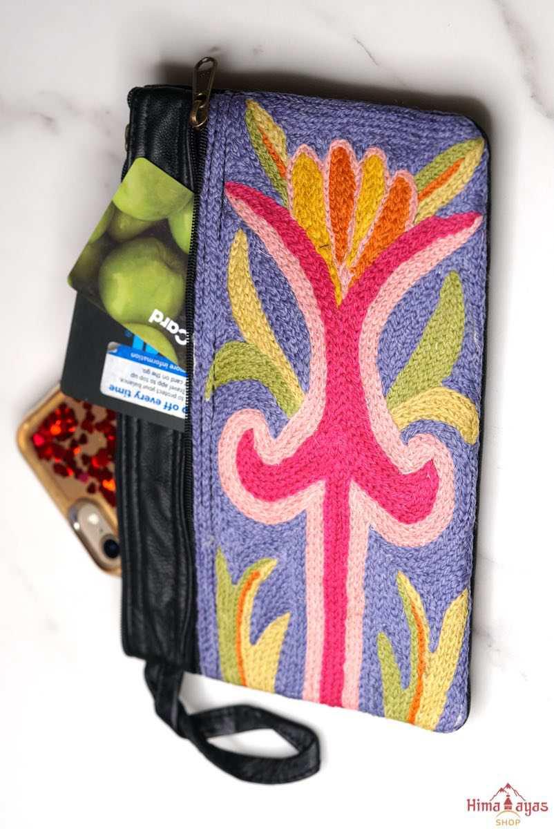 A stylish and ethically made wristlet purse to carry all your everyday essentials.