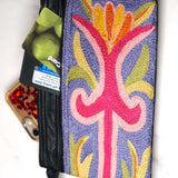 A stylish and ethically made wristlet purse to carry all your everyday essentials.