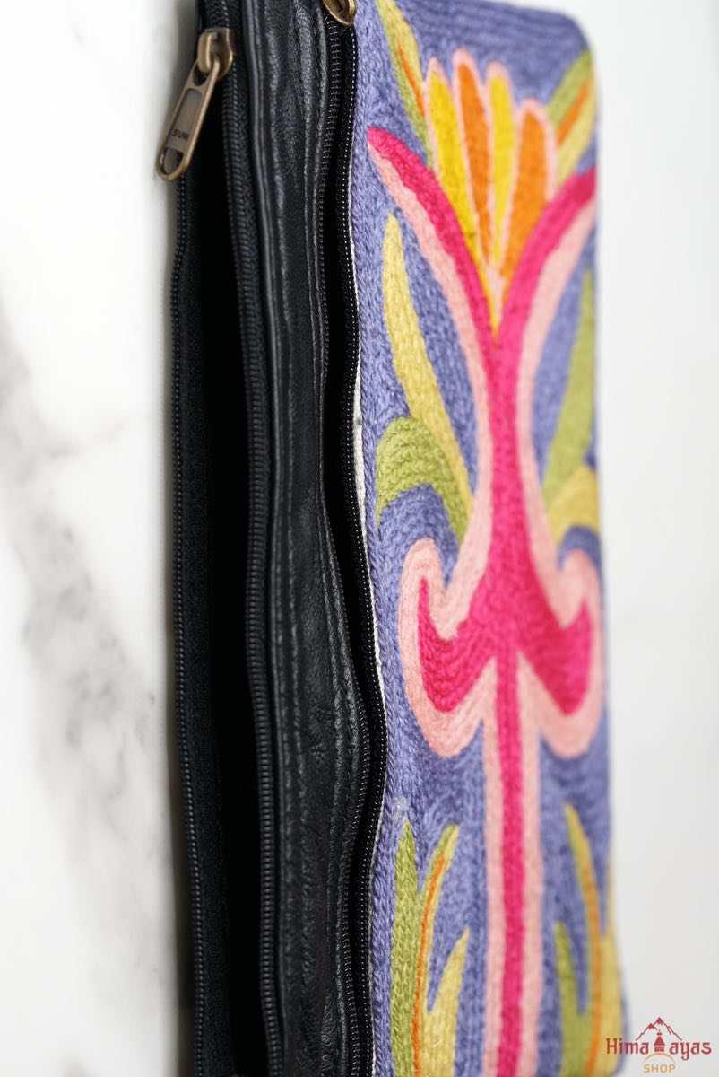 A stylish and ethically made wristlet purse to carry all your everyday essentials.