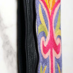 A stylish and ethically made wristlet purse to carry all your everyday essentials.