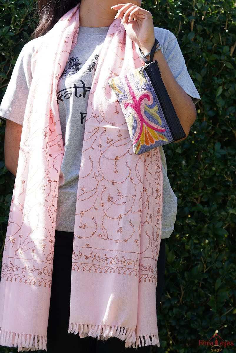 A stylish and ethically made wristlet purse to carry all your everyday essentials.