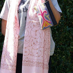 A stylish and ethically made wristlet purse to carry all your everyday essentials.