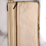 A stylish yet convenient hand woven wristlet purse with beautiful floral pattern, It has a secure zip top closure and two extra compartments for your everyday essentials making it easy to travel simple and light.