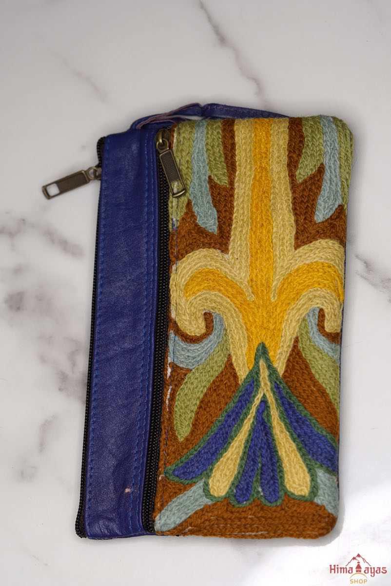 A stylish and ethically made wristlet purse to carry all your everyday essentials.