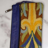 A stylish and ethically made wristlet purse to carry all your everyday essentials.