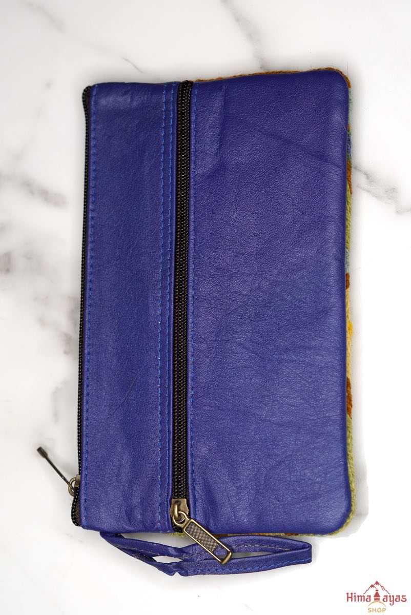 A stylish and ethically made wristlet purse to carry all your everyday essentials.