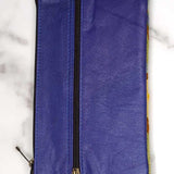 A stylish and ethically made wristlet purse to carry all your everyday essentials.