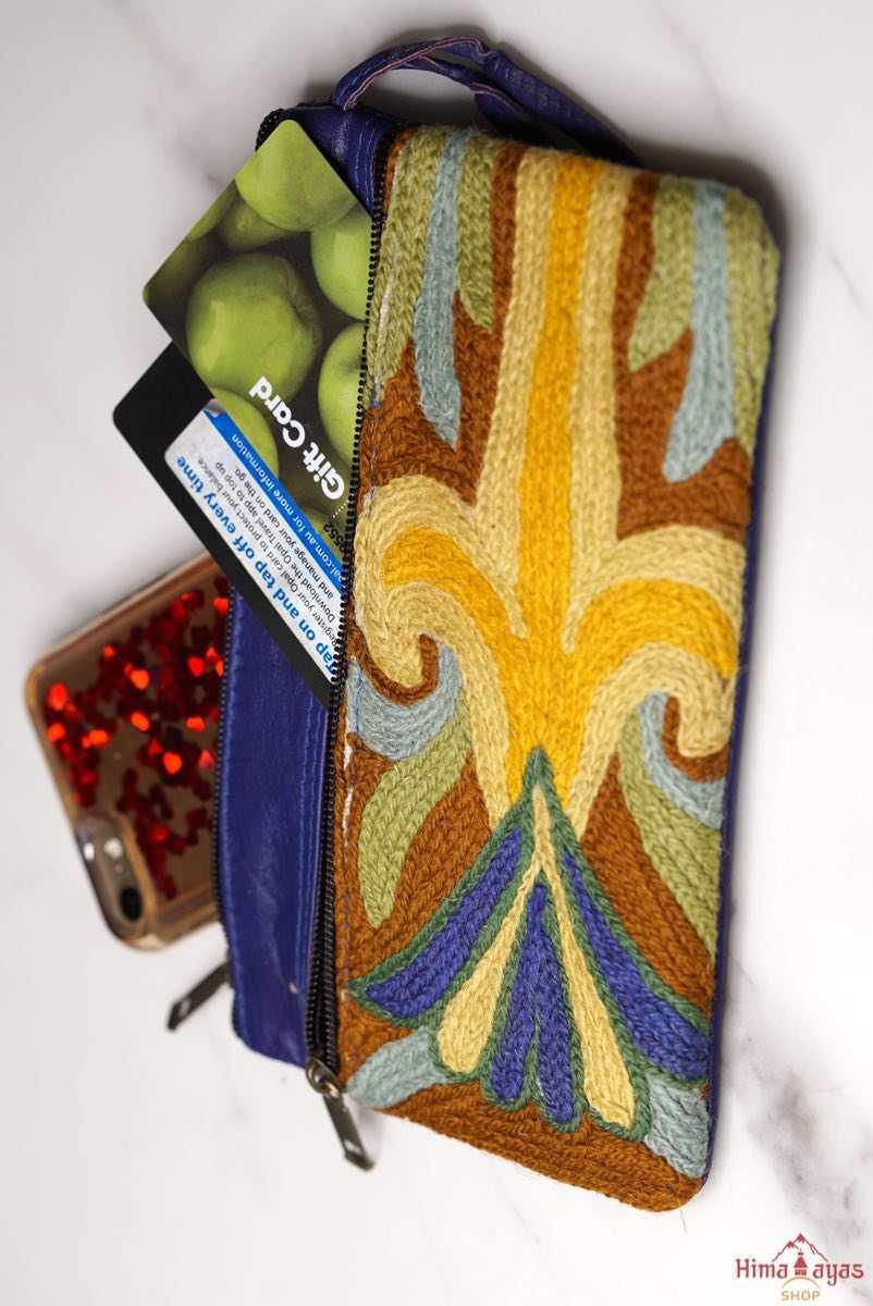 A stylish and ethically made wristlet purse to carry all your everyday essentials.