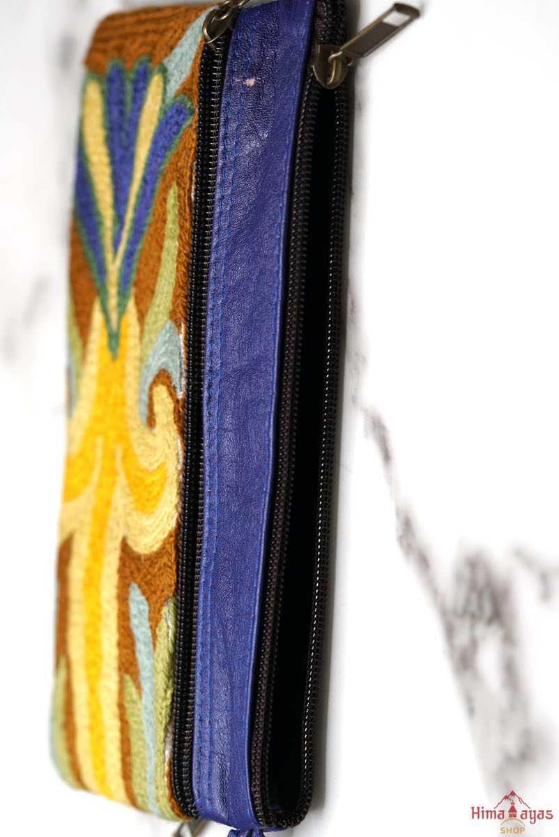 A stylish and ethically made wristlet purse to carry all your everyday essentials.