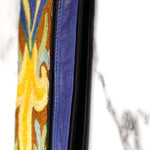 A stylish and ethically made wristlet purse to carry all your everyday essentials.