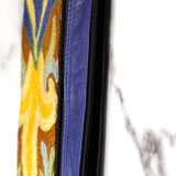 A stylish and ethically made wristlet purse to carry all your everyday essentials.