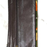 A beautifully hand-embroidered purse with a wristlet and a secure zip top closure. Perfect gift for your loved ones!