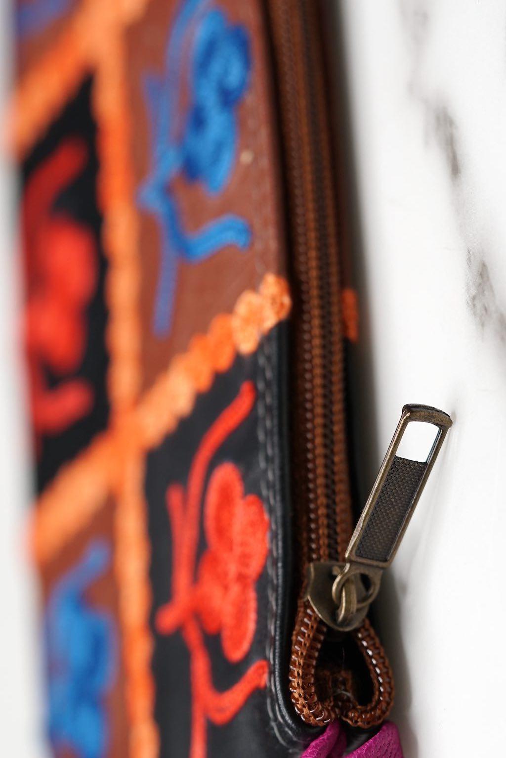 Beautiful handmade wristlet purse with Kashmiri embroidery for everyday use.