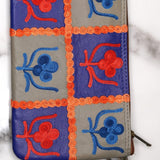 Beautiful handmade wristlet purse with Kashmiri embroidery for everyday use.