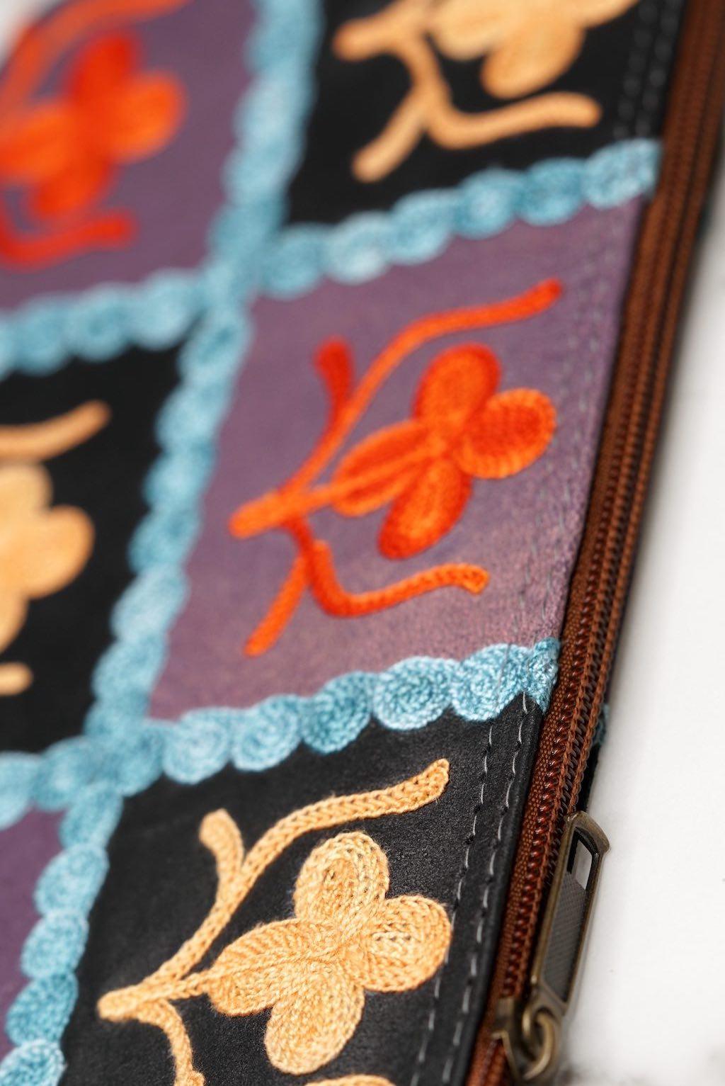 Beautiful handmade wristlet purse with Kashmiri embroidery for everyday use.