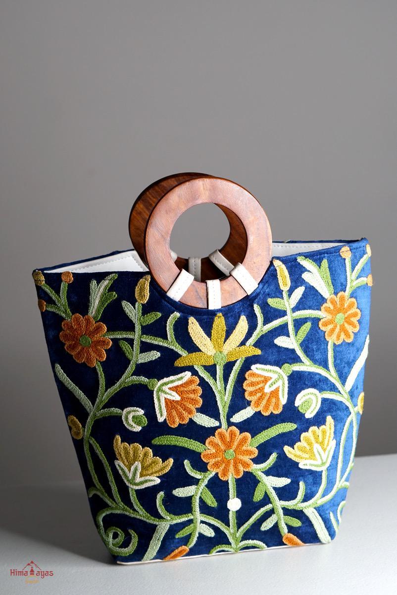 A classic women's tote bag, crafted with beautiful cashmere floral embroidery to give it a chic stylish look.