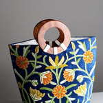 A classic women's tote bag, crafted with beautiful cashmere floral embroidery to give it a chic stylish look.