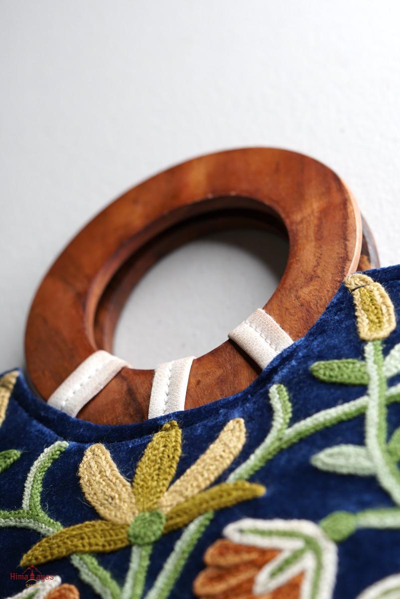 A classic women's tote bag, crafted with beautiful cashmere floral embroidery to give it a chic stylish look.