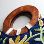 A classic women's tote bag, crafted with beautiful cashmere floral embroidery to give it a chic stylish look.