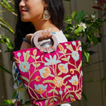 A classic women's tote bag, crafted with beautiful cashmere floral embroidery to give it a chic stylish look.