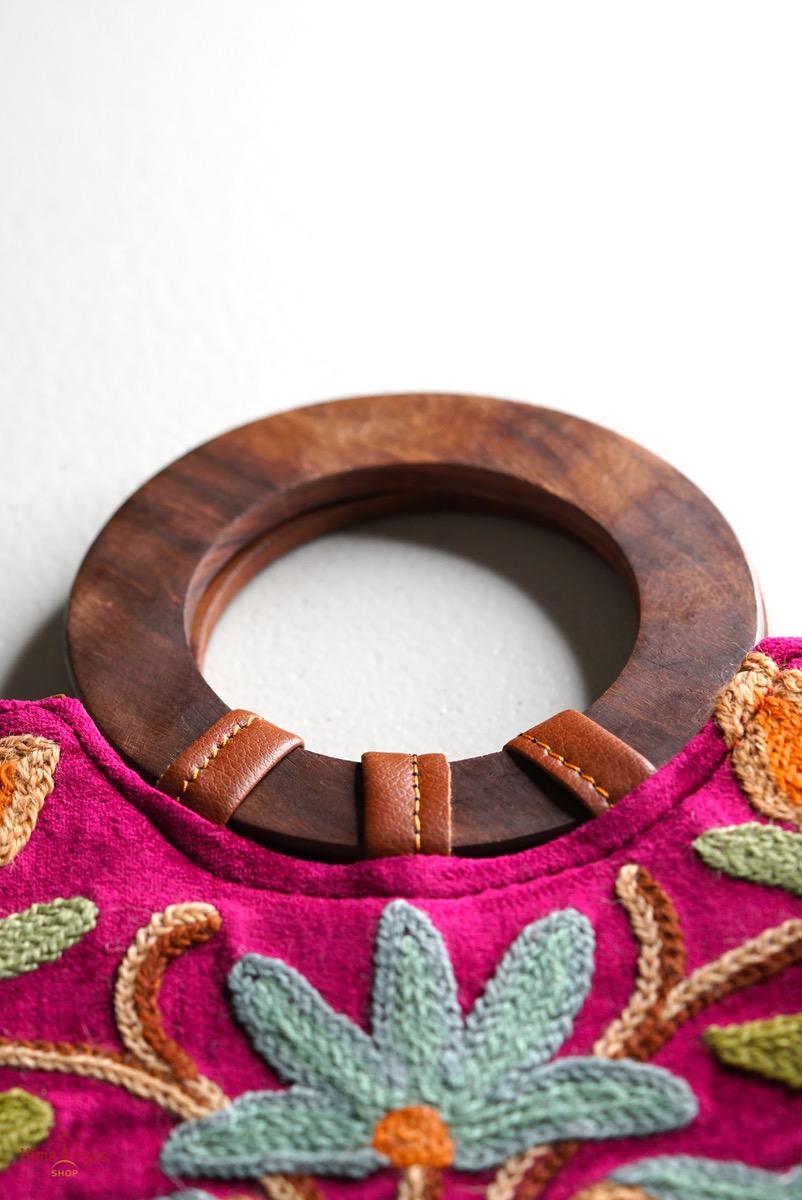 A classic women's tote bag, crafted with beautiful cashmere floral embroidery to give it a chic stylish look.