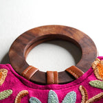 A classic women's tote bag, crafted with beautiful cashmere floral embroidery to give it a chic stylish look.