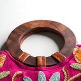 A classic women's tote bag, crafted with beautiful cashmere floral embroidery to give it a chic stylish look.