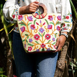 A stylish women's tote bag with floral pattern, crafted ethically from Himalayas.
