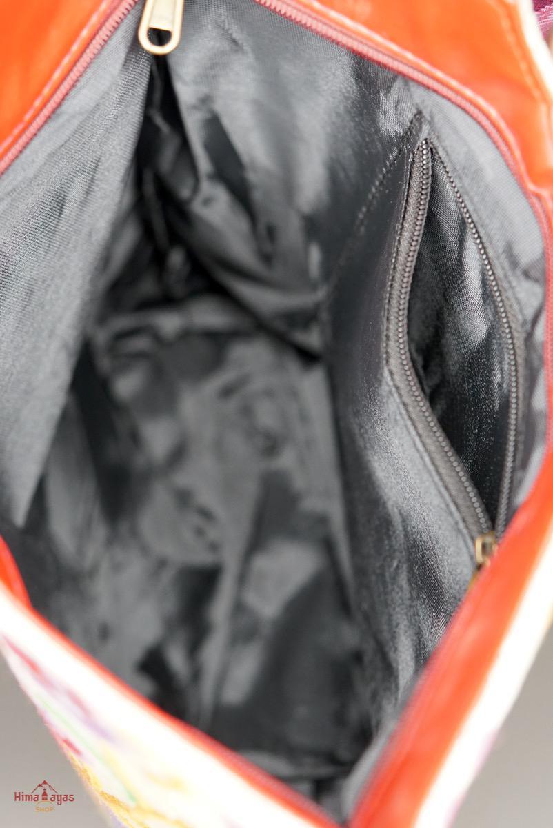 A stylish women's tote bag with floral pattern, crafted ethically from Himalayas.