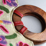 A stylish women's tote bag with floral pattern, crafted ethically from Himalayas.