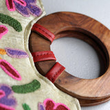 A stylish women's tote bag with floral pattern, crafted ethically from Himalayas.