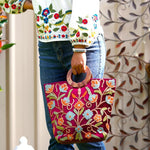 Beautiful hand embroidered tote bag with bright and multi-colour embroidered floral patterns.