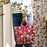 Beautiful hand embroidered tote bag with bright and multi-colour embroidered floral patterns.