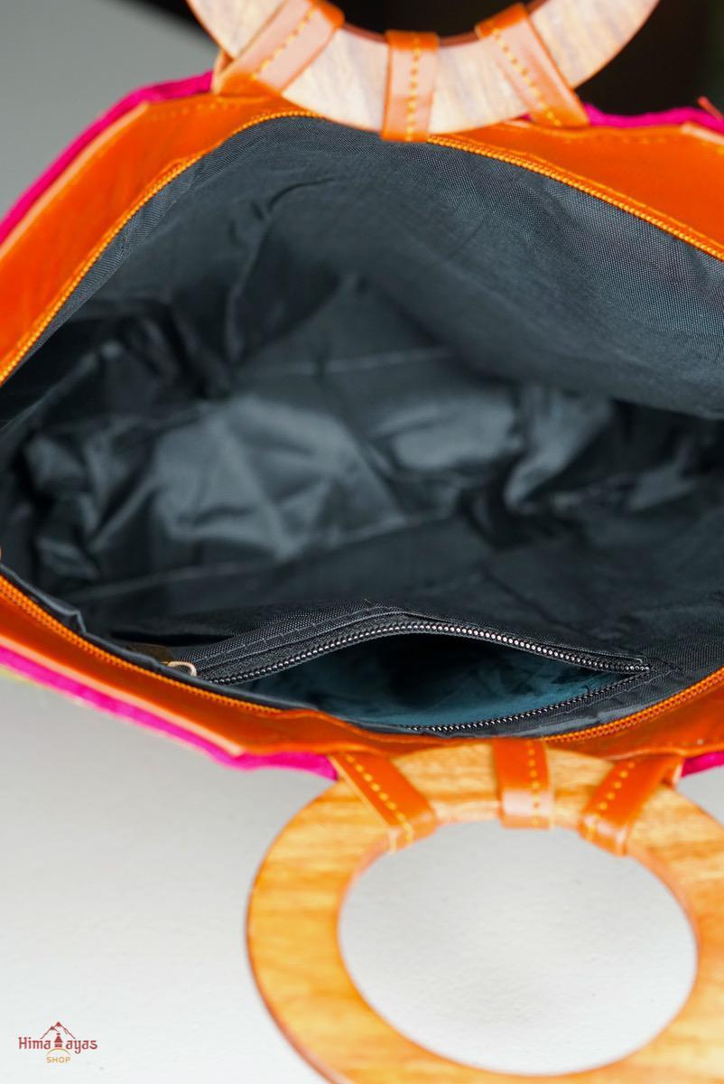 Beautiful hand embroidered tote bag with bright and multi-colour embroidered floral patterns.