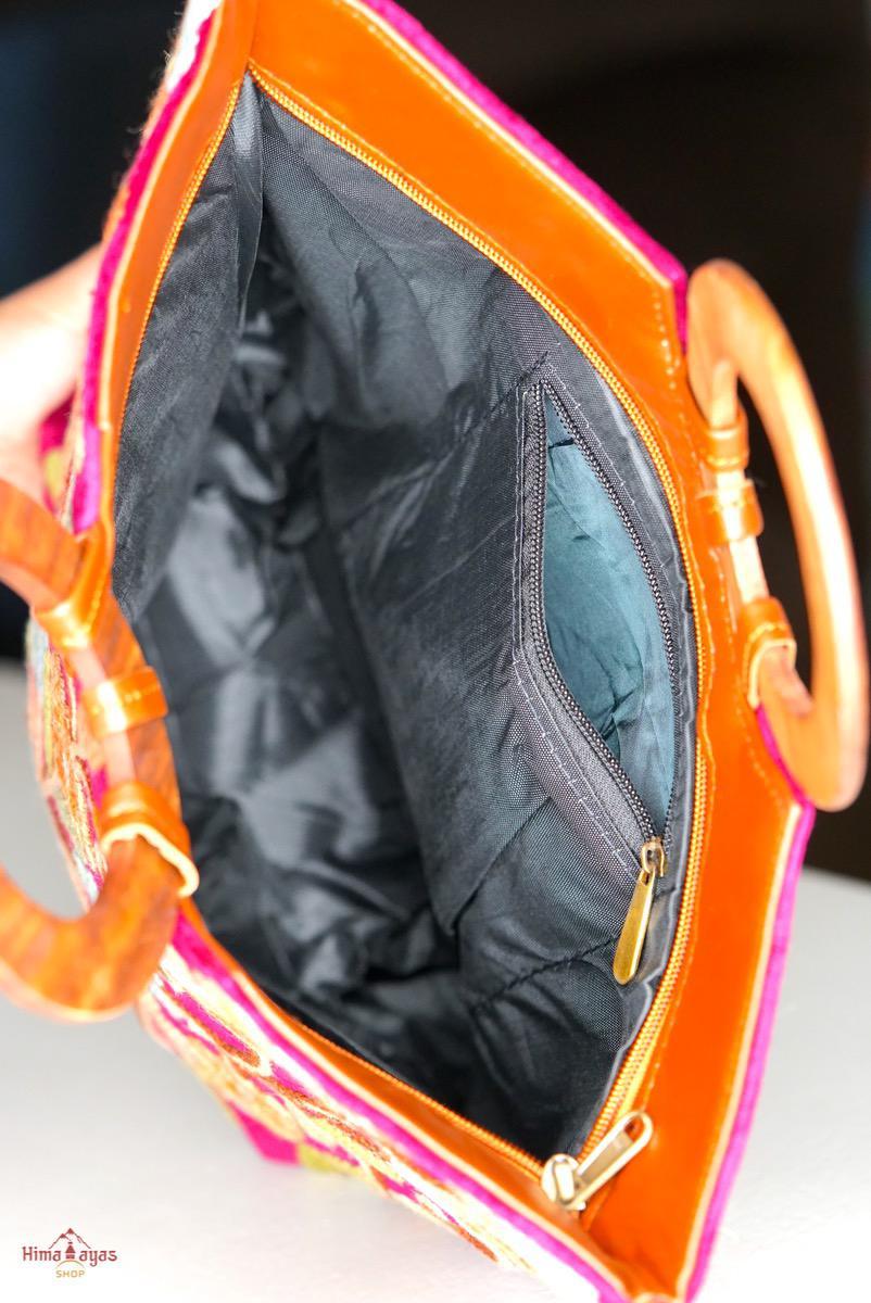 Beautiful hand embroidered tote bag with bright and multi-colour embroidered floral patterns.