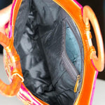 Beautiful hand embroidered tote bag with bright and multi-colour embroidered floral patterns.