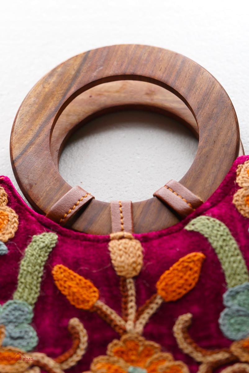 Beautiful hand embroidered tote bag with bright and multi-colour embroidered floral patterns.