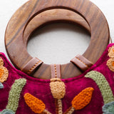 Beautiful hand embroidered tote bag with bright and multi-colour embroidered floral patterns.