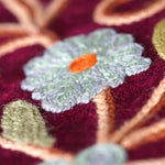 Beautiful hand embroidered tote bag with bright and multi-colour embroidered floral patterns.