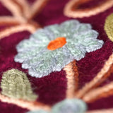 Beautiful hand embroidered tote bag with bright and multi-colour embroidered floral patterns.