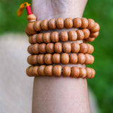 Natural Bodhi Bead Wrist Mala being worn