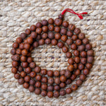 Antique Dark Bodhi Bead Mala aerial view