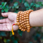 Natural Bodhi Bead Wrist Mala being worn