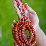 Vajra & Bell Dorje Bodhi Mala being held