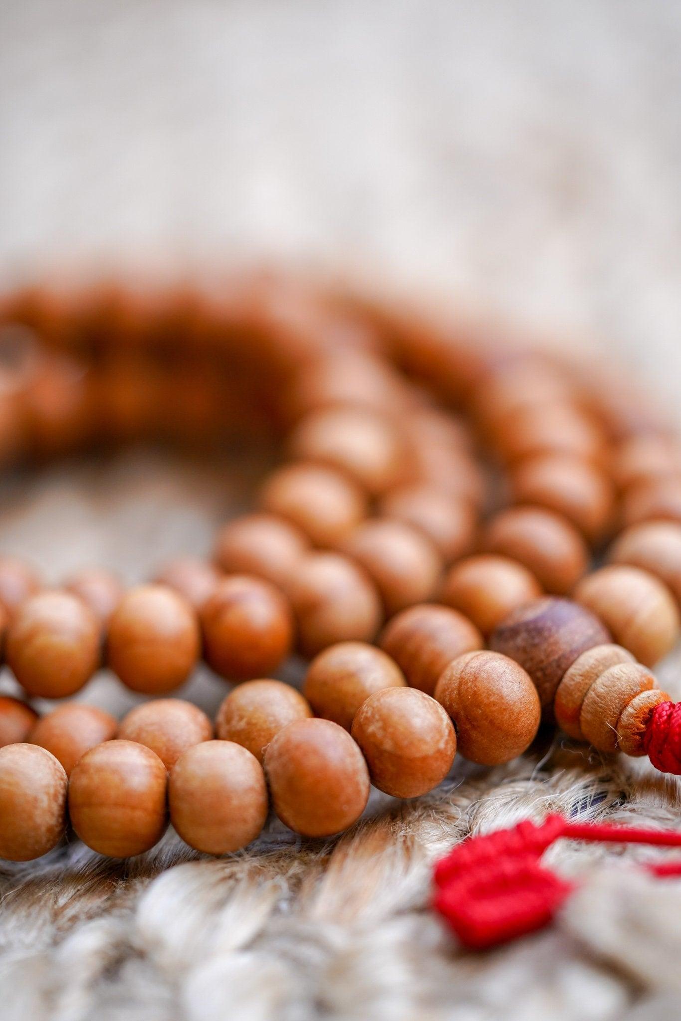 108 Beads Sandalwood Mala side view