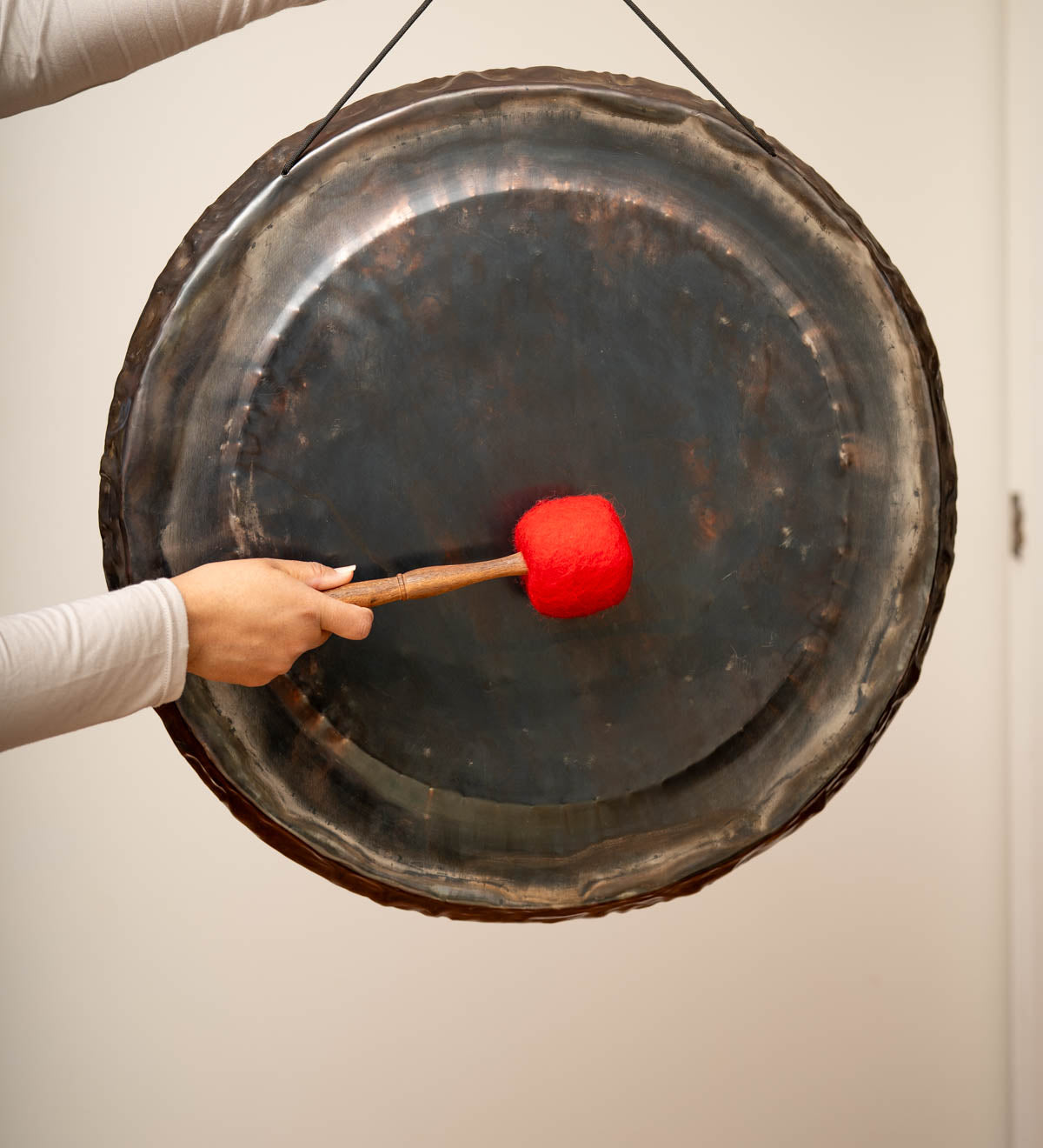 Rustic Black Gong for sound healing.
