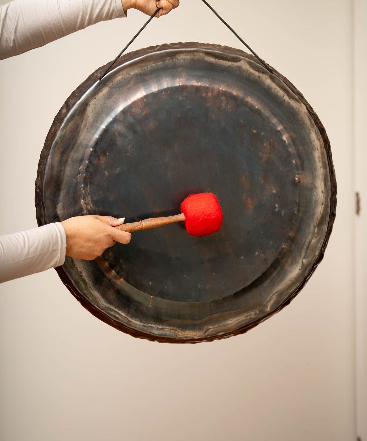 Rustic Black Gong for sound healing.