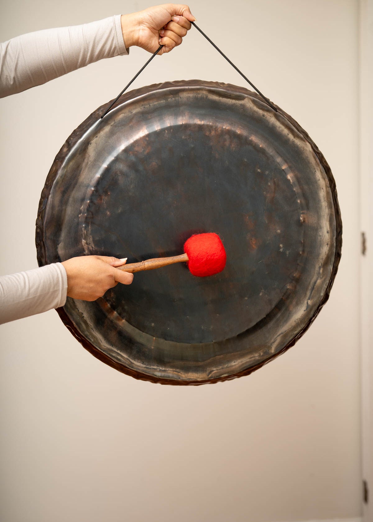 Rustic Black Gong for sound healing.